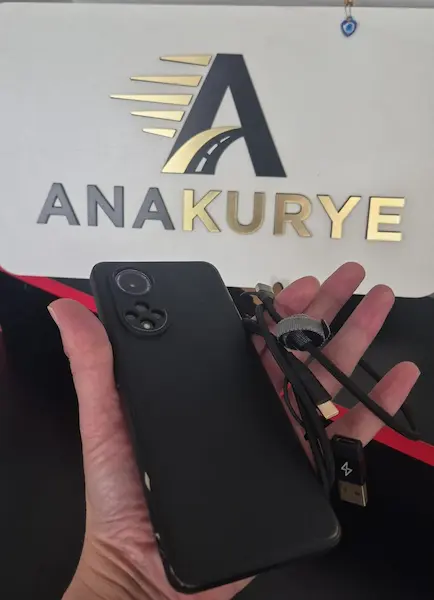 Recovered Huawei Nova 9 phone and charging cable at the Ana Kurye office