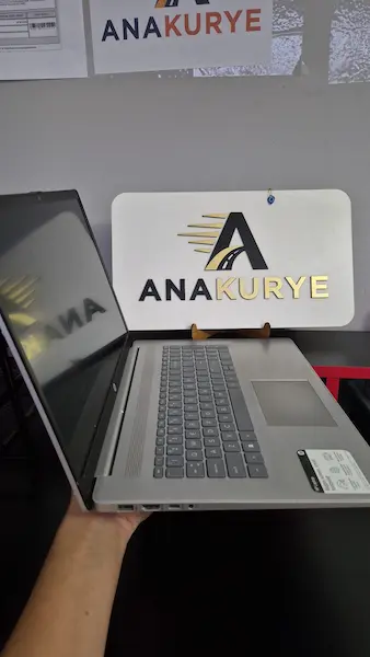 Recovered laptop photographed at Ana Kurye office before international shipping