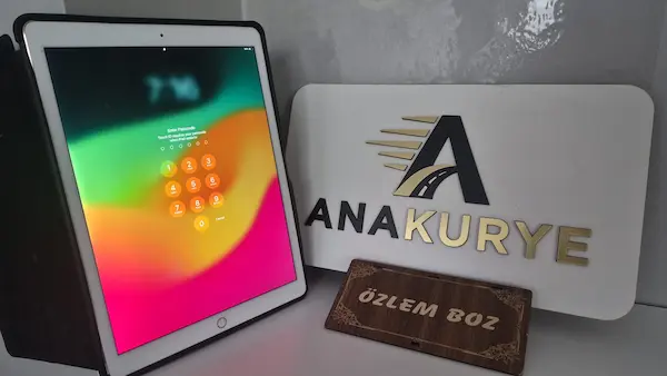 Recovered iPad beside the Ana Kurye sign at the office in Istanbul